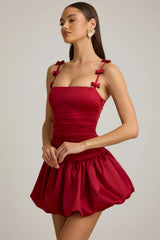 Bow-Detail Ruched Bubble Hem Mini Dress in True Red