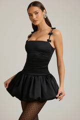 Bow-Detail Ruched Bubble Hem Mini Dress in Black